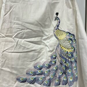 Beth Bowley Cream skirt  with Elegant peacock Detailing